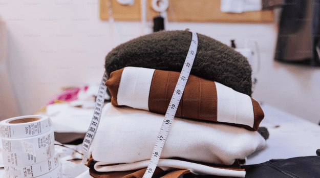 Person working on sewing machine